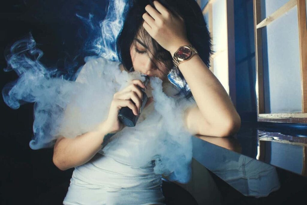 Woman vaporizing