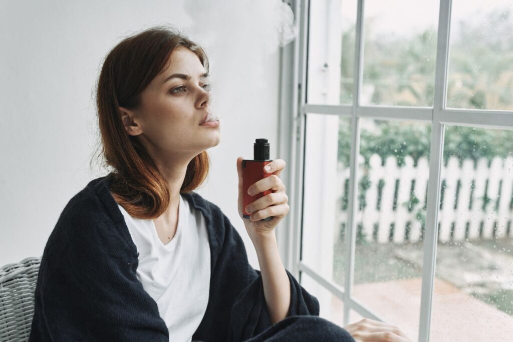 A lady vaping thch vape and getting relax
