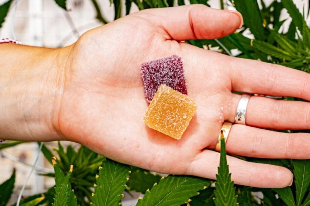 A lady showing muha meds thca gummies