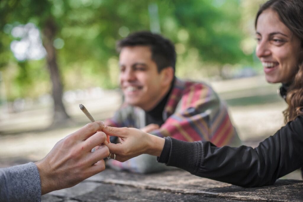 Friends smoking Cannabis pre-roll
